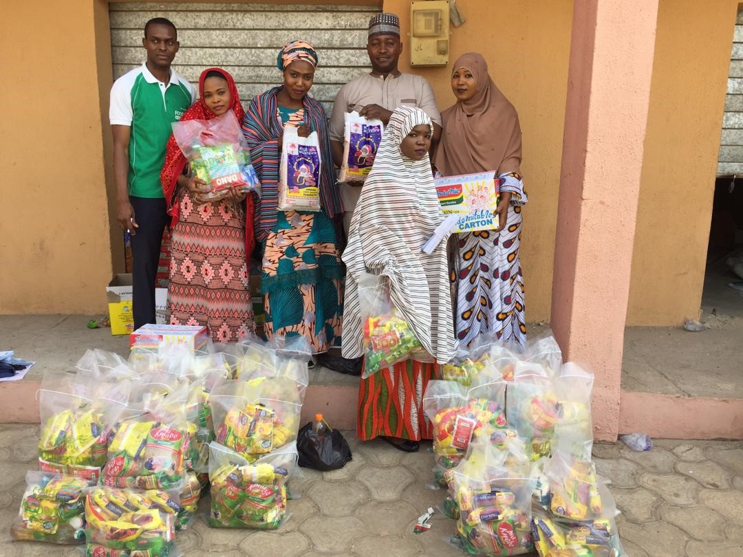 Volunteers arranging food packs